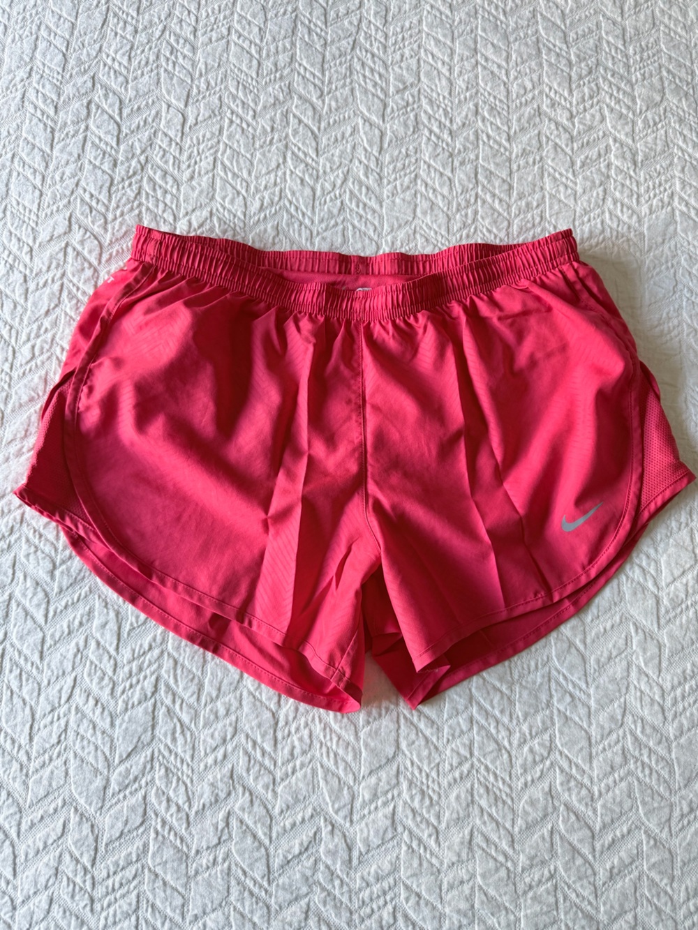 Nike Women's Bright Pink Athletic Shorts with Silver Swoosh